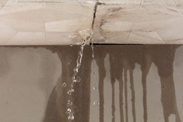 Professional Flood Damage Cleanup technician working in New London, NH